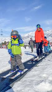 magic carpet ski lift skiing kids