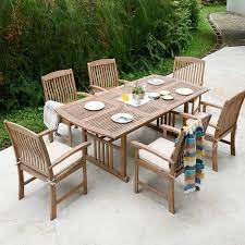 Many of our teak outdoor dining sets include folding, stacking and extending options for added practicality. Corpuz Rectangular 6 Person 60 25 Long Teak Dining Set With Cushions Teak Patio Furniture Outdoor Dining Set Outdoor Furniture