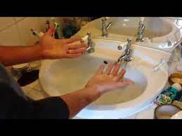 how to unblock a sink with your bare