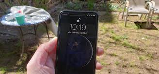 A person using finger gestures on their phone while wearing. Instantly Unlock Your Iphone With Face Id No Swipe Needed Ios Iphone Gadget Hacks