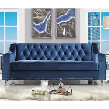 velvet tufted sofa in navy blue
