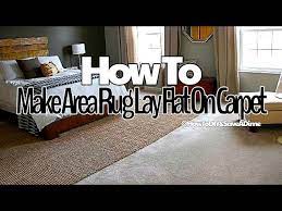 how to lay a area rug flat on carpet