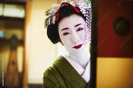 woman dressed in the traditional geisha