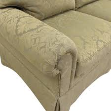 three cushion skirted sofa