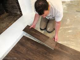 Installation methods vary among vinyl sheet flooring products depending on the construction of the sheet. How To Install Vinyl Plank Over Concrete Orc Week 4 5 The Happy Housie