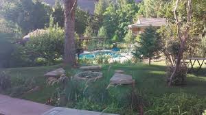 pool and gardens at cliffrose lodge