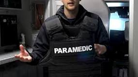 Can EMTs wear vests?