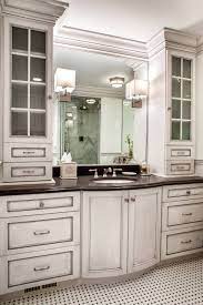 Keep the existing surface or add a stone countertop, and install a simple sink bowl. Custom Bathroom Cabinets Houzz