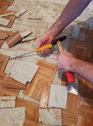 how to remove glued down wood flooring