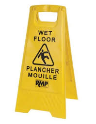 wet floor sign bilingual southwest