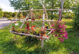 A tunnel type arched trellis is amazing, especially when there are delicious fruits, veggies and pretty flowers hanging from it. How To Make A Rose Trellis Gorgeous Garden Diy