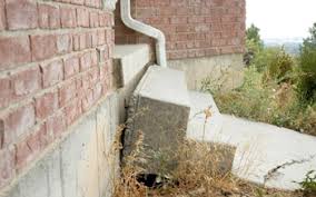 sinking concrete patio stoop repair