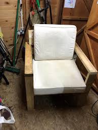 Painted chairs are a charming addition to any home. Cushioned Pallet Armchair Diy Easy Pallet Ideas