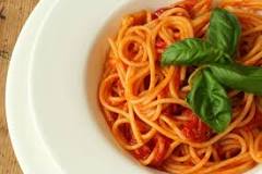 Why do people put carrot in spaghetti sauce?