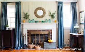 summer mantel with mason jars and