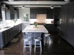 gray kitchen cabinets with white marble