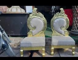 white and golden wooden mandap chair