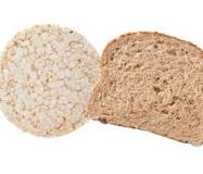 What has more carbs rice cakes or bread?