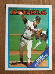 Los angeles dodgers pitcher don sutton, right, sits at his dressing locker tuesday, oct. 1988 Topps 575 Don Sutton California Angels Hall Of Fame Nm Nice Card Ebay In 2020 Anaheim Angels Baseball Baseball Cards Angels Baseball