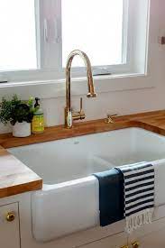 How to install a farmhouse kitchen sink? Kitchenideasremodeling In 2020 Cast Iron Kitchen Sinks Kitchen Interior Farmhouse Sink Kitchen