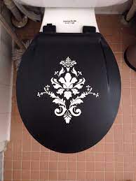 Toilet Seat With A Vinyl Decal Seal