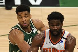 Even though height is almost synonymous with basketball players, not all professionals are seven feet tall. Suns Nba Title Hopes Hang Most Heavily On Ayton S Shoulders Bright Side Of The Sun