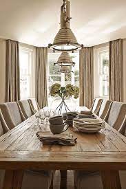 taupe dining room with bay window