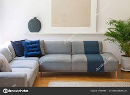 blue pillows grey corner couch living