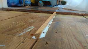 wood floor repairs gap filling and