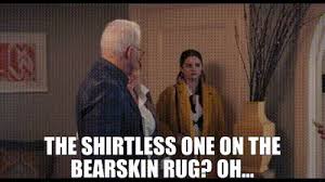 shirtless one on the bearskin rug
