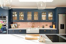 Take a cue from patchwork harmony and keep your countertops and cabinets neutral. East Dulwich Kitchen Herringbone Kitchens
