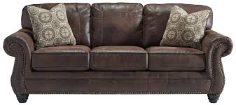 Lowest prices at ashley catalog. Benchcraft By Ashley Breville 20010500140700 Faux Leather Sofa With Rolled Arms And Nailhead Trim Coconis Furniture Mattress 1st Sofas