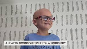 young boy battling cancer surprised