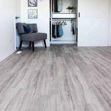 Measure the width of the room from the longest wall and divide the distance by the width of the planks. Transforming A Space By Installing Vinyl Plank Flooring Love Create Celebrate Vinyl Plank Flooring Grey Vinyl Plank Flooring Installing Vinyl Plank Flooring