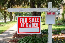 Picture Of House For Sale By Owner Sign On A Wooden Post In A