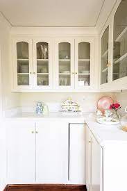 vintage style kitchen pantry with glass