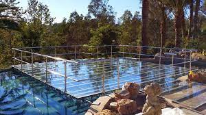 clear acrylic pool cover over swimming