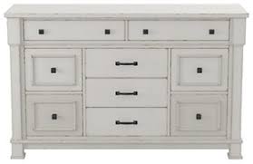 • use a bureau to organize art supplies in a craft room. White Bedroom Dressers Chests Of Drawers Ashley Furniture Homestore