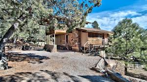 ious house nestled in ruidoso pines