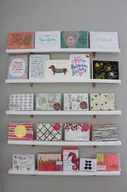 This greeting card stand is sold with an additional clip to be mounted on the top and display your message. Diy Greeting Card Display Wall For Your Office