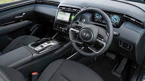 It's super simple and very minimalist, with a large central. Hyundai Tucson Hybrid Interior Comfort Drivingelectric