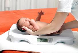 newborn weight gain how much is normal