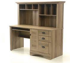 The desk is made out of oak wood with a dark tint and has capacious. Shop Our Harbor View Salt Oak Computer Desk With Hutch By Sauder 415109 Joe Tahan S Furniture