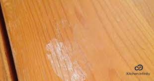 remove rubbing alcohol stains from wood