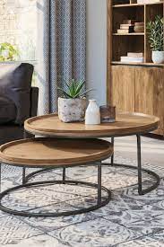 Baker recommends this boxy coffee table, which she says would work just as well in a contemporary room as in one that leans more traditional. Next Amsterdam Round Coffee Nest Natural Table Decor Living Room Coffee Table Coffee Table Next