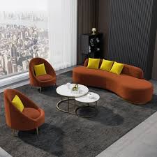 orange velvet upholstered curved sofa