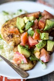 To make the avocado salsa, halve the avocados, remove the stone and peel away the skin, cut the flesh into 1cm cubes and place in a large bowl. Coriander Lime Chicken With Chunky Avocado Salsa The Wanderlust Kitchen