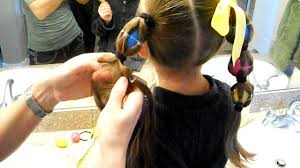 1.) gather the back part of your hair just like you would do for a regular half up, then divide that into three sections and secure two of them with elastics to keep them out of the way. Egg Tails Ponytails Easter Crazy Hair Day Cute Girls Hairstyles Youtube