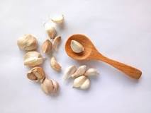 How much pre minced garlic is a clove?