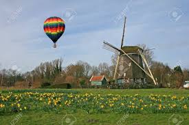 Holland sea of flowers hot air balloon. Hot Air Balloon And Windmill In Holland Stock Photo Picture And Royalty Free Image Image 2691631